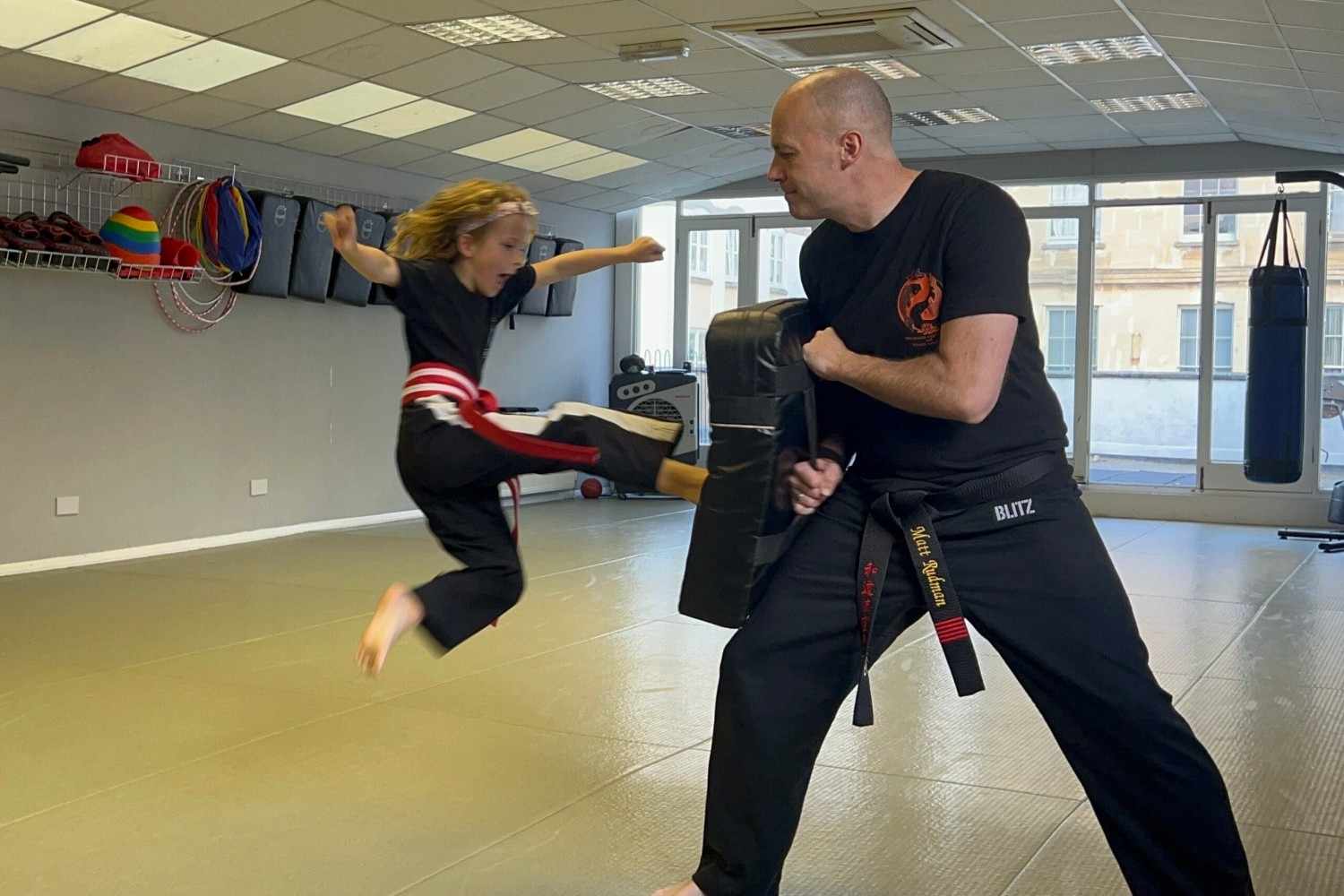 flying kick by a martial arts student